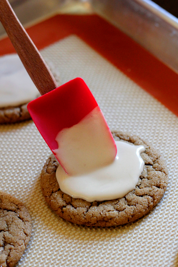 GingerMolassesIcing Gently top the ginger molasses cookies with a dollop of icing
