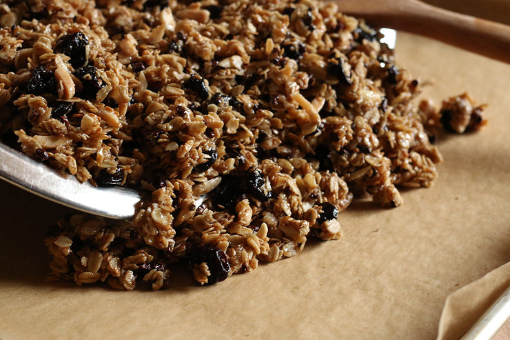 Pour the granola onto a single baking sheet. AlmondCherryCacaoGranolaBarsPour