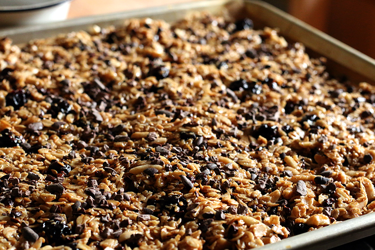Spread the granola evenly in baking sheet. AlmondCherryCacaoGranolaBarsSheet