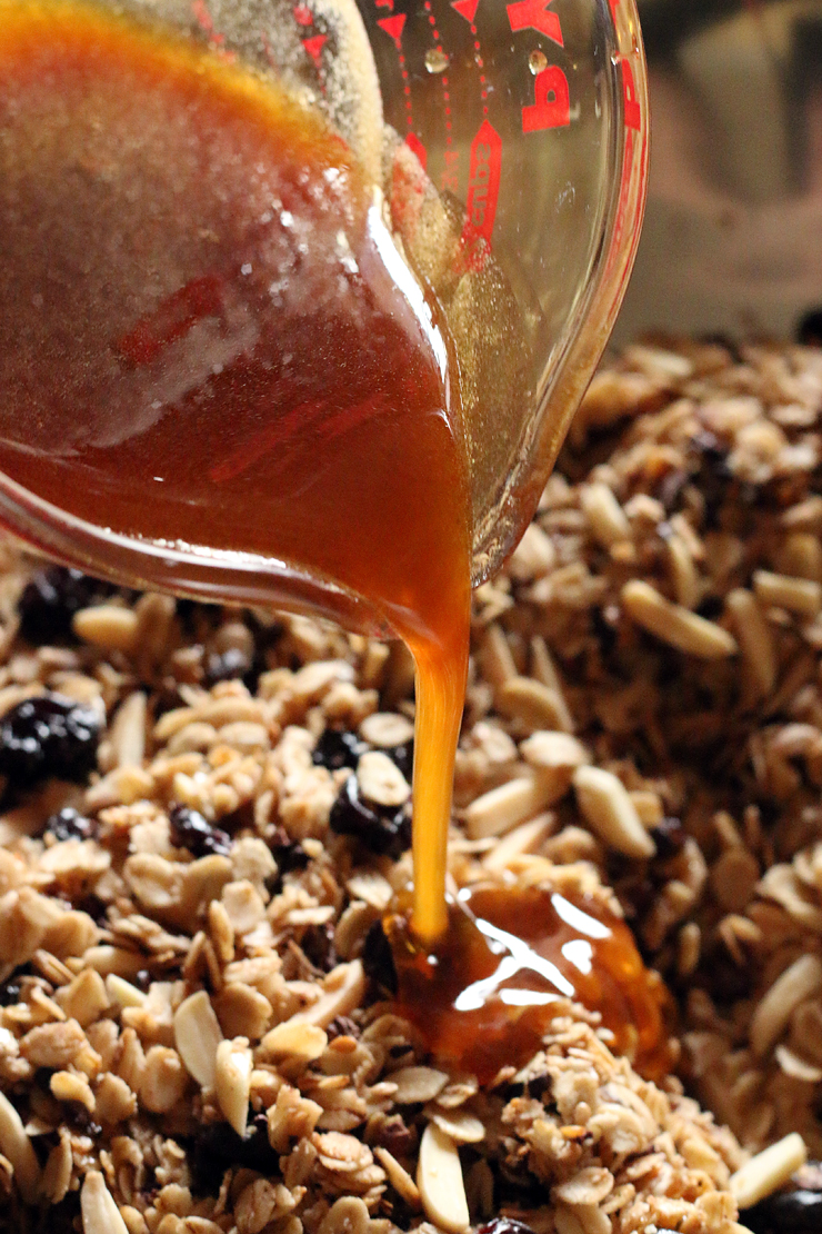 Once the syrup melts, pour it over the oat mixture.