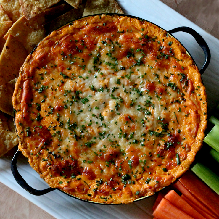 WhiteBeanBuffaloDipSquare.jpg Spicy White Bean Buffalo Dip with Baked Lime Tortilla Chips and Veggie Sticks