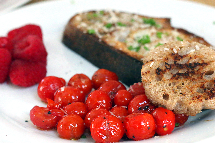 eggs on a raft and sautéed cherry tomatoes eggs on a raft and sautéed cherry tomatoes