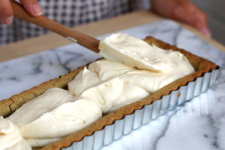 Blind baking beans for rolling tart dough for Fig Mascarpone Tart with Pistachio Black Pepper Crust - filling