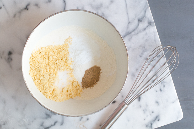 Sift together the flour, cornmeal, salt, baking powder and cardamom.