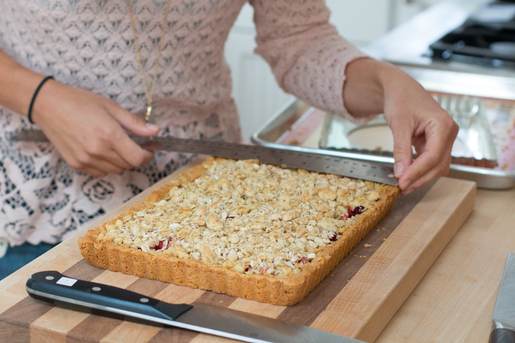 measuring crumble bars to be cut
