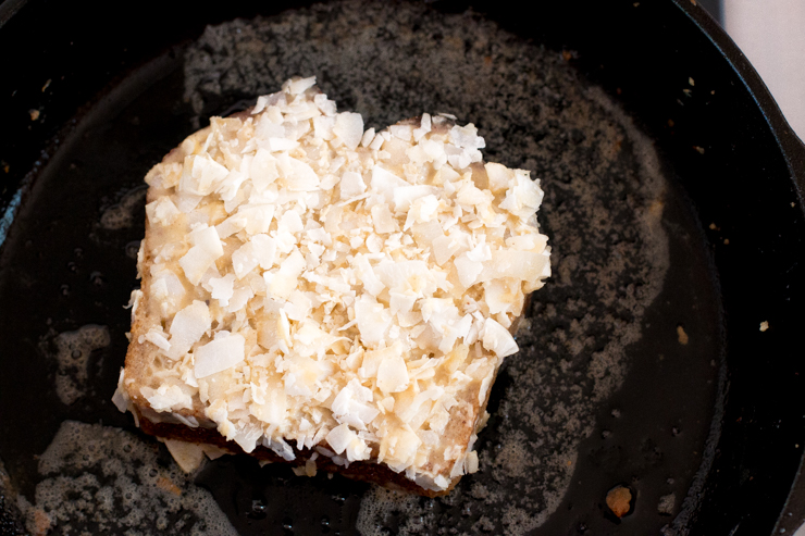 Coconut French Toast frying in cast iron skillet