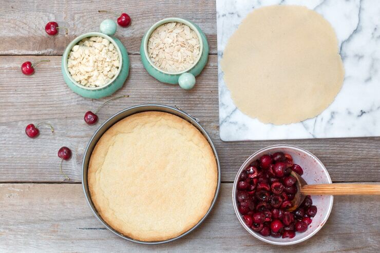 Cherry Almond Shortbread Crumble Tart assemmbly Cherry Almond Shortbread Crumble Tart assemmbly