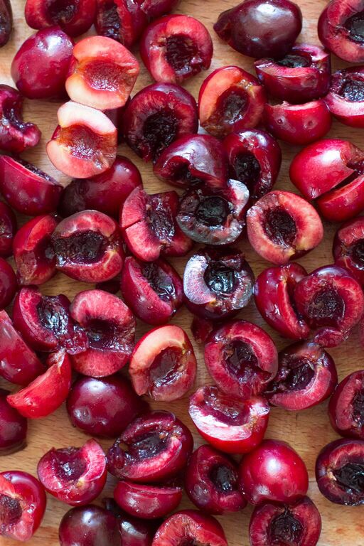 pitted and halved cherries pitted and halved cherries