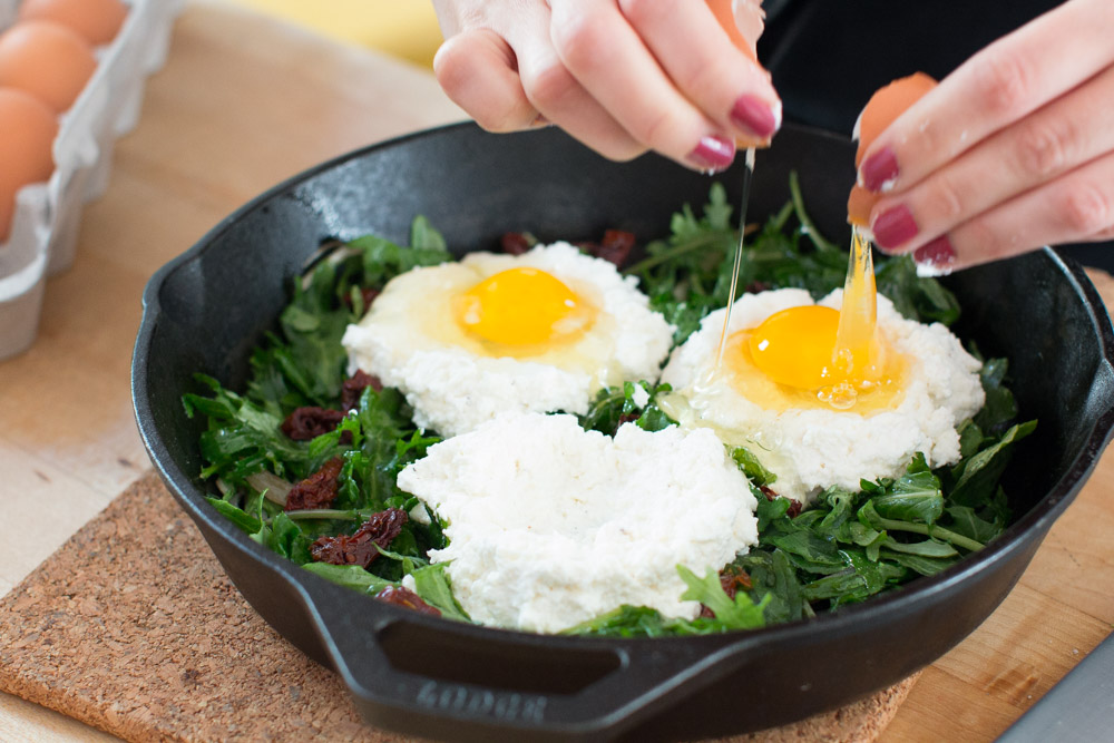Baked Eggs with Ricotta, Greens & Sun Dried Tomatoes egg drop ricotta and eggs