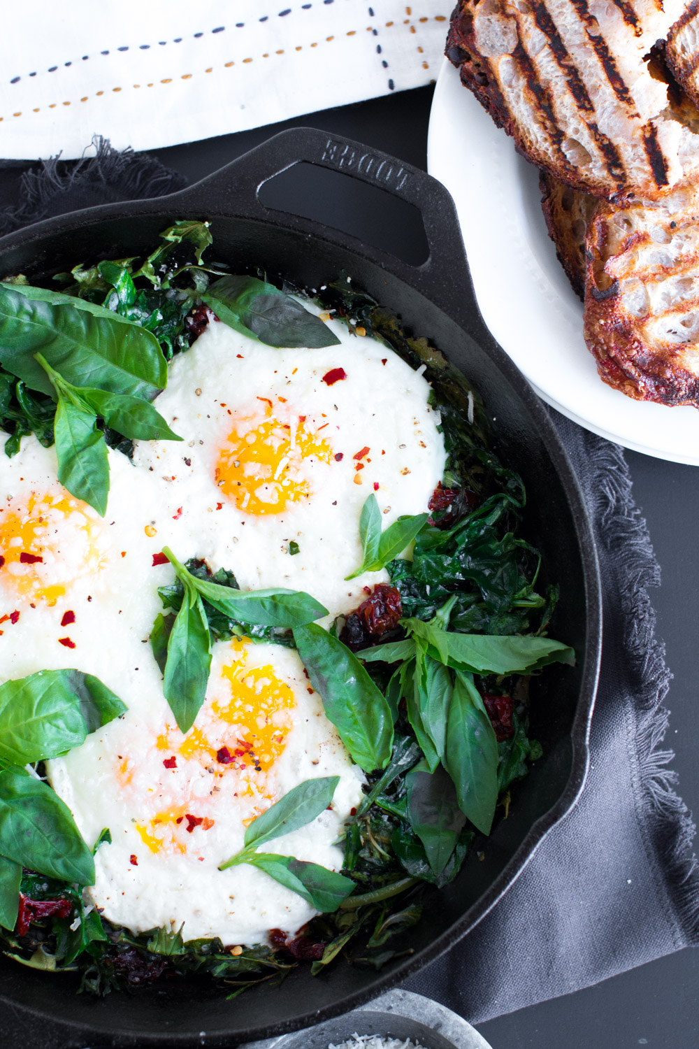 Baked Eggs with Ricotta, Greens & Sun Dried Tomatoes Baked Eggs with Ricotta, Greens & Sun Dried Tomatoes-31