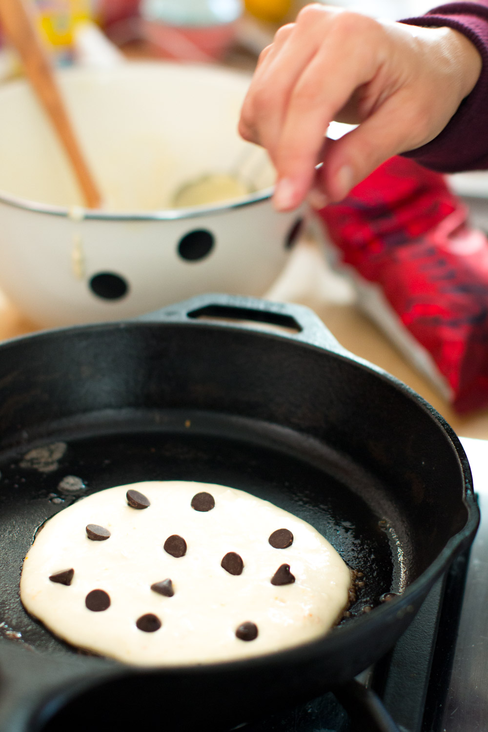 Ricotta pancakes with dark chocolate chips cooking