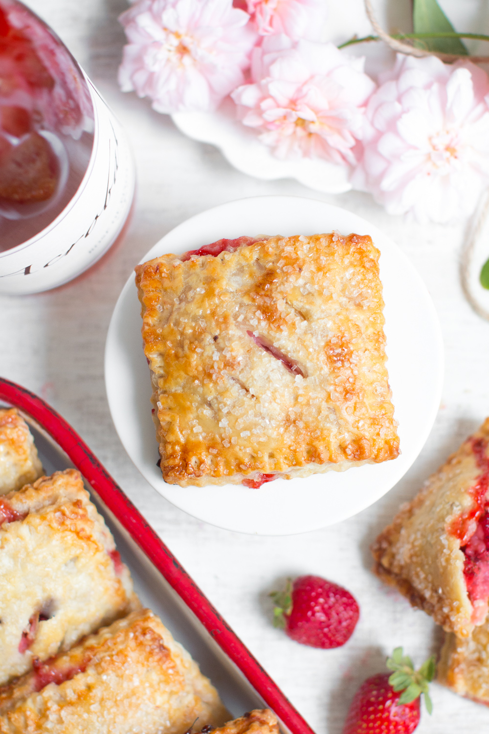 Strawberry Rhubarb Hand Pies and a bottle of Acrobat Rosé