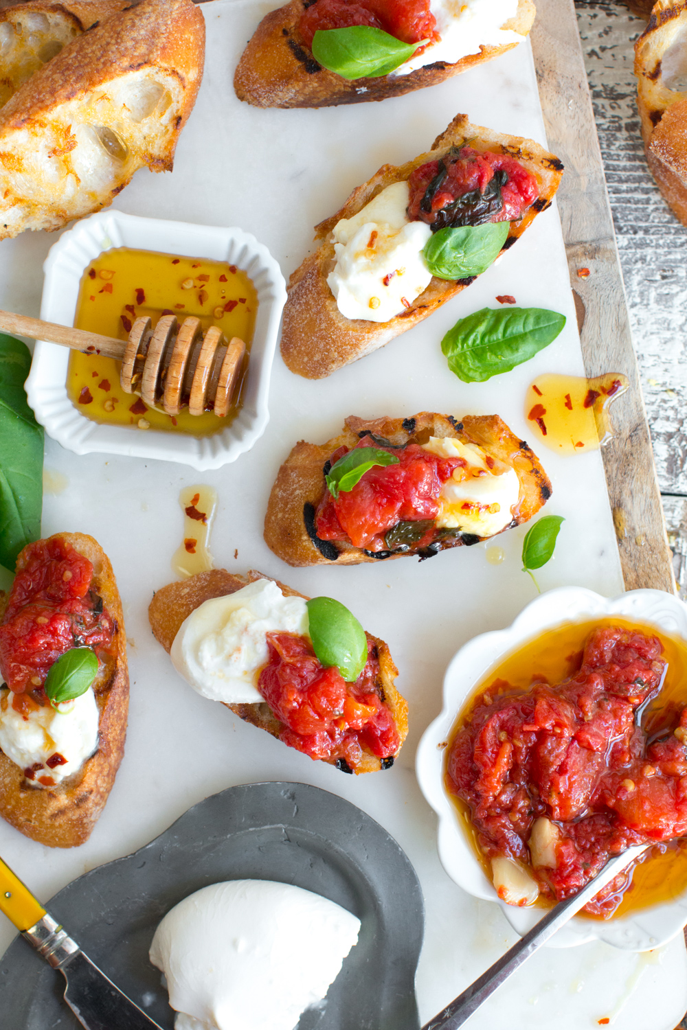 Tomato Confit & Burrata Crostini assembly