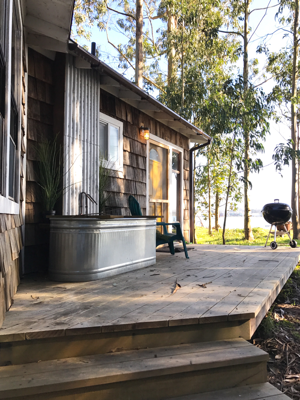 The porch and tub at the Mid Century Cabin at Oyster Beach Social Club in Eureka, CA.