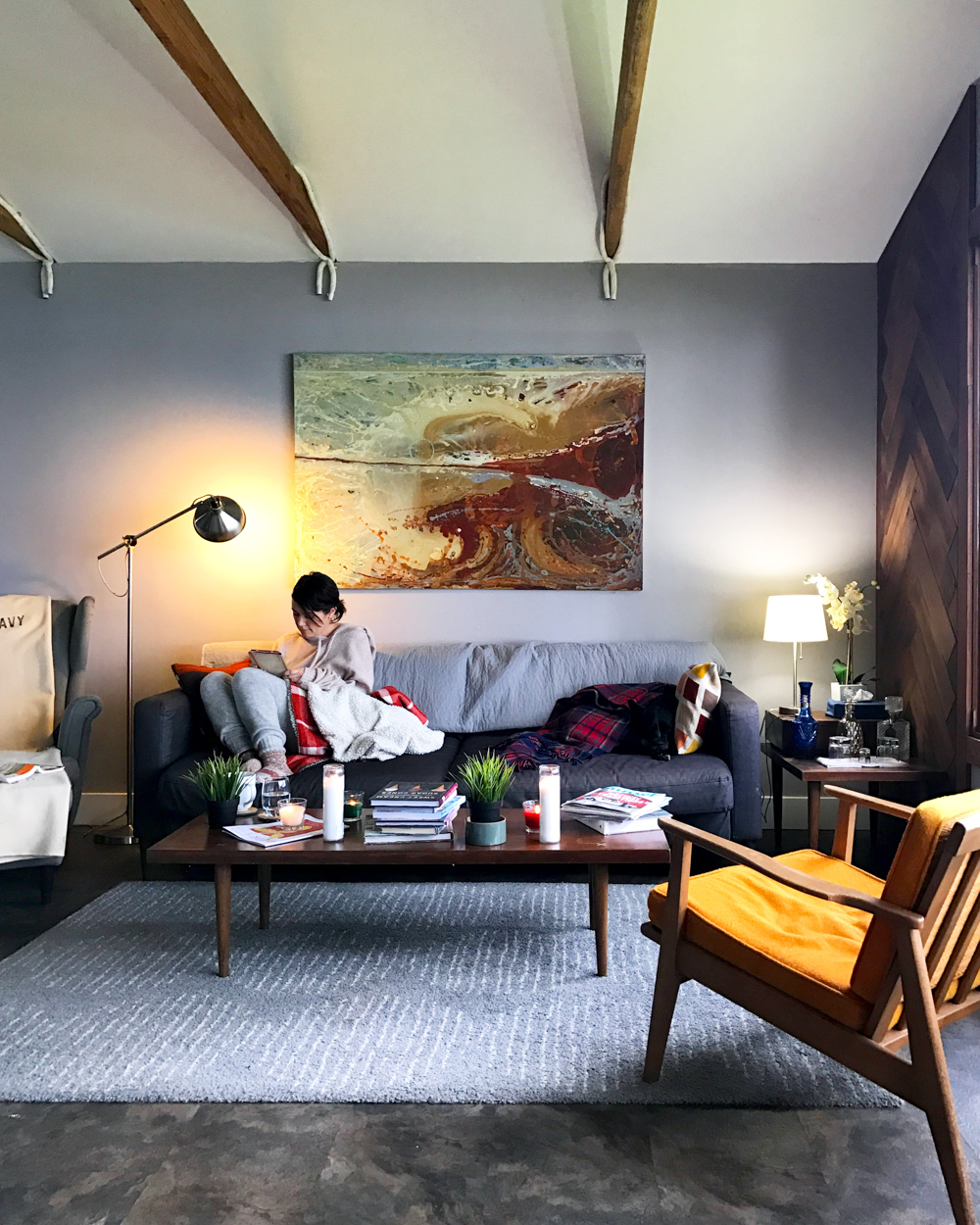 Lounging in my pjs and reading all the living long day at the Mid Century Cabin by Oyster Beach Social Club in Eureka, CA.