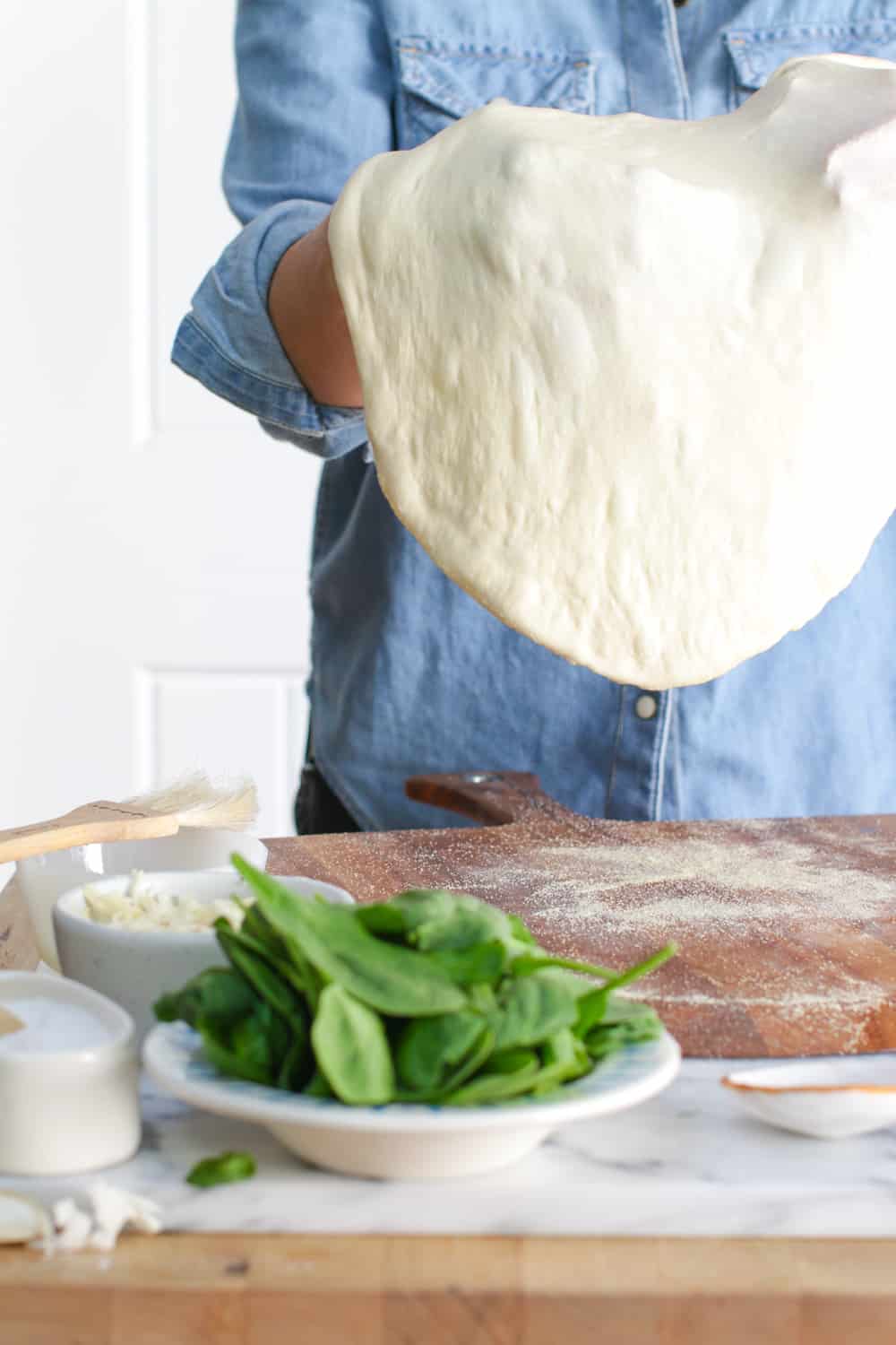Pizza dough stretch.