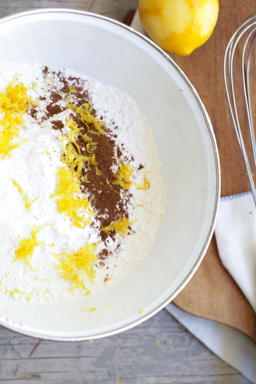 Pro Tip: Whisk the lemon zest with the dry ingredients. They'll get coated in flour and it will keep them from clumping up together in your dough.