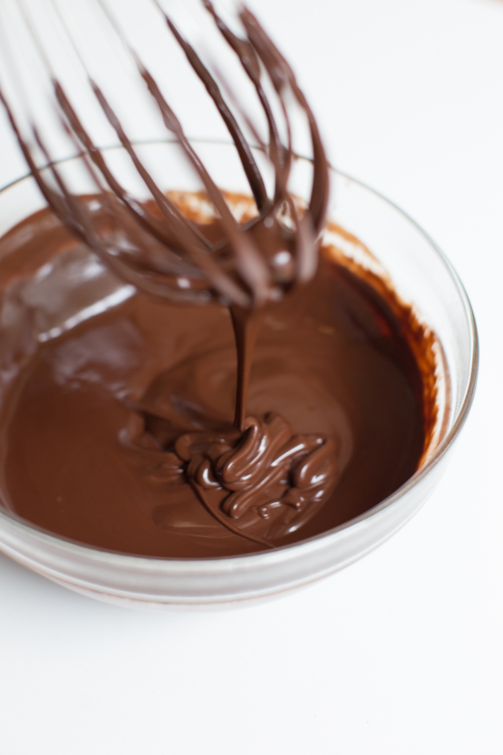 Smooth, melty chocolate give the Black and White Animal Cookie Cupcakes a deep flavor.