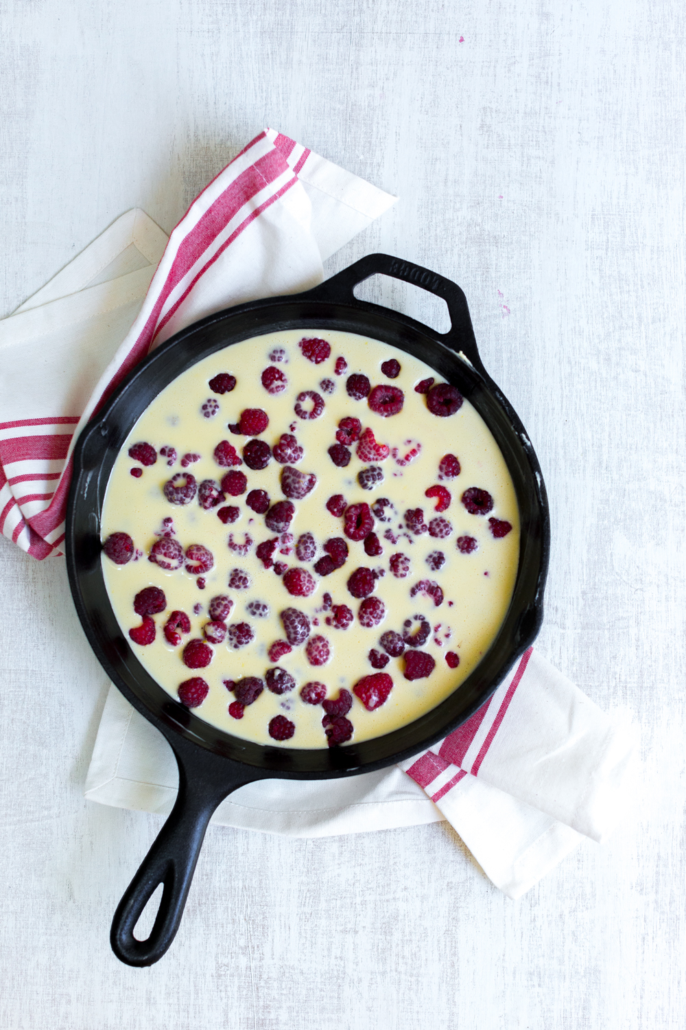 Pour the batter right over the berries in a cast iron skillet and bake. So easy.