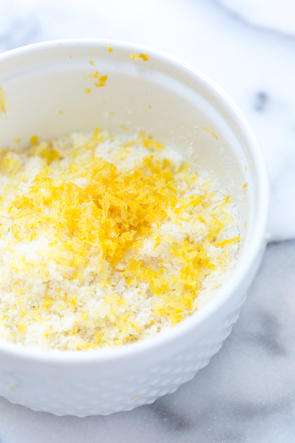 Mushing the lemon zest with the sugar gives the whole Raspberry Buttermilk Clafoutis a zesty sweetness.