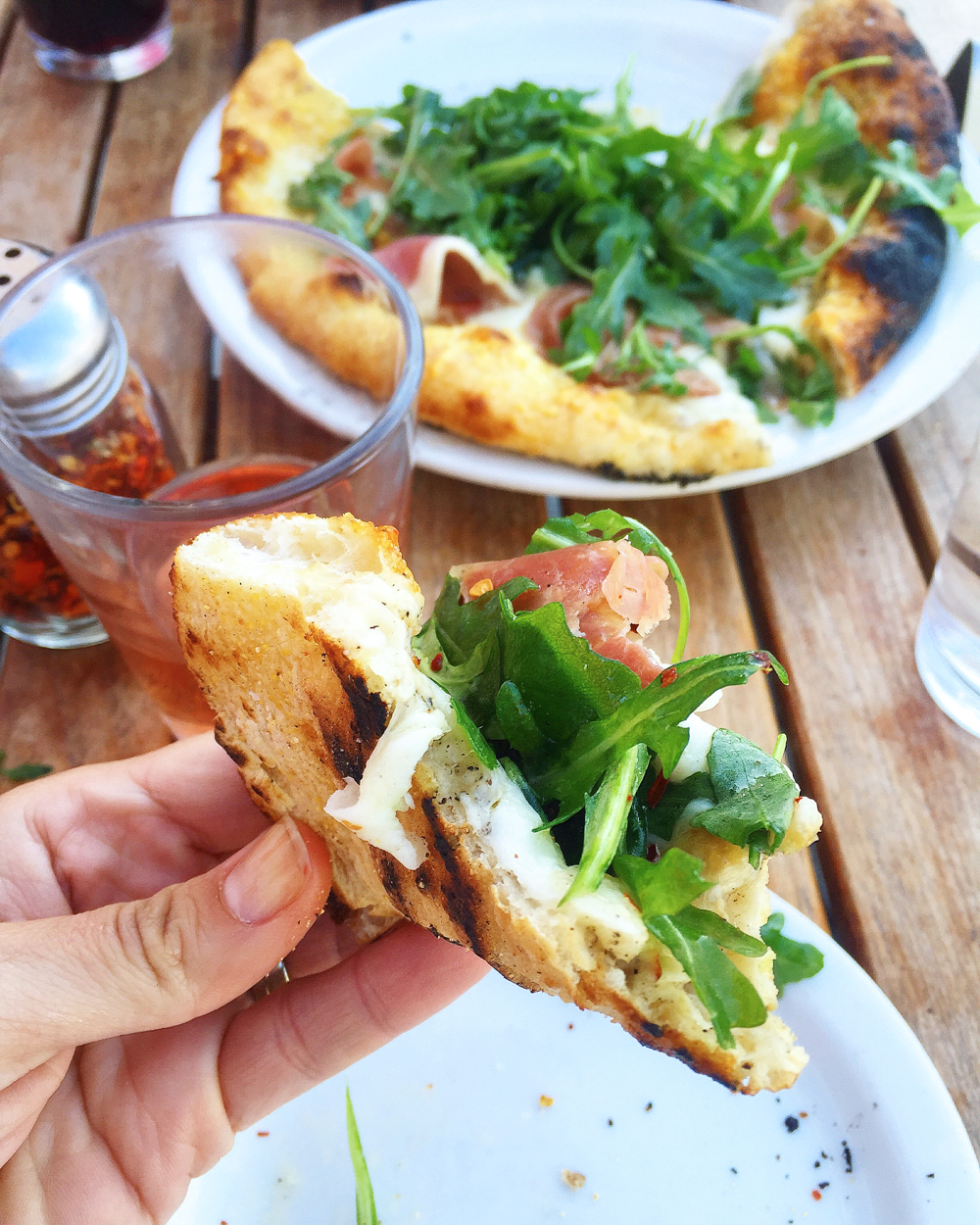 Prosciutto, Taleggio, Parmesan, Arugula Pizza from Industrial Eats