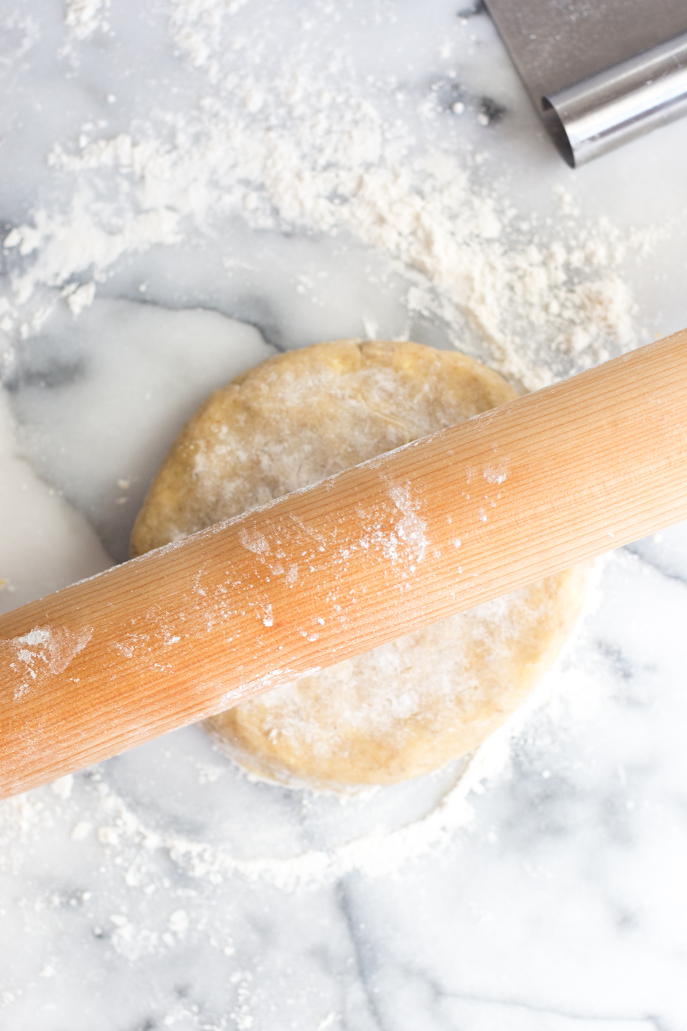 rolling out the peach pie dough