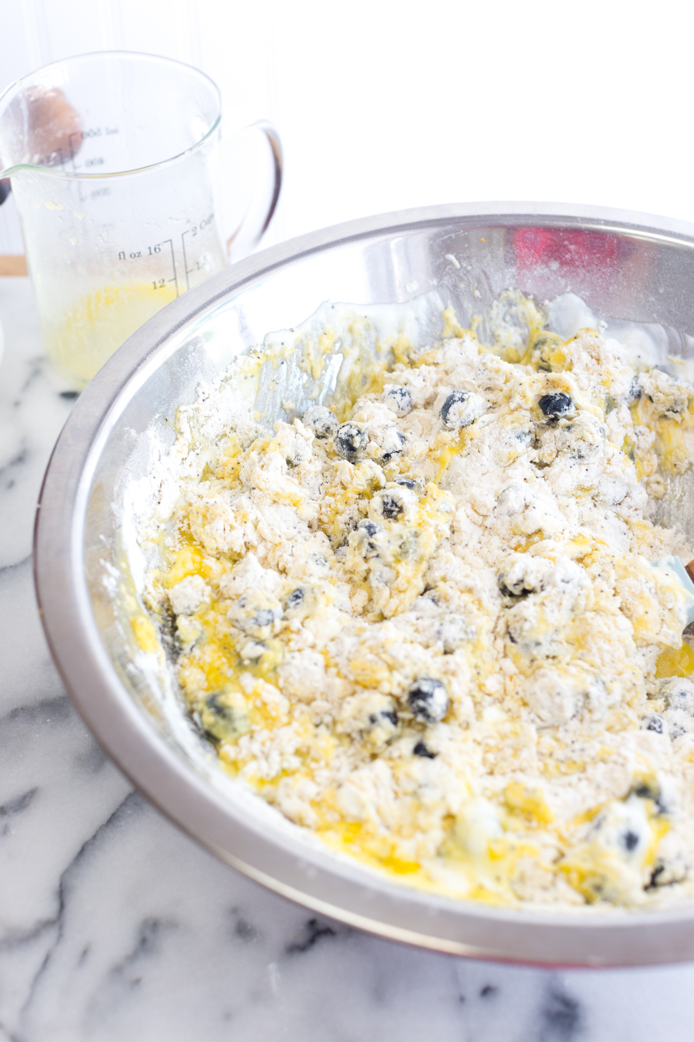 Folding folding the Blueberry Lemon Poppy Seed Muffin batter.