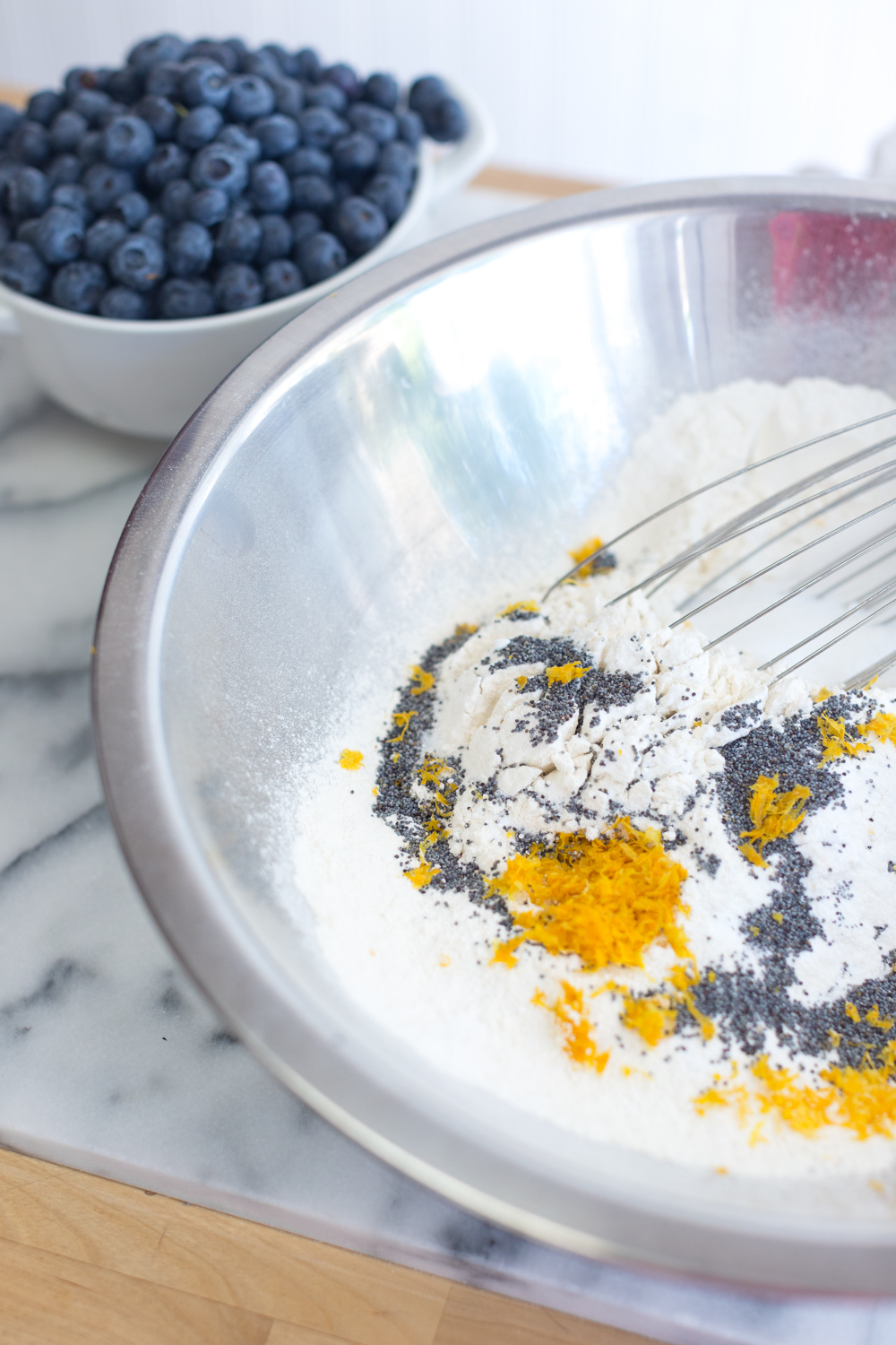 Dry ingredients for Blueberry Lemon Poppy Seed Muffins.