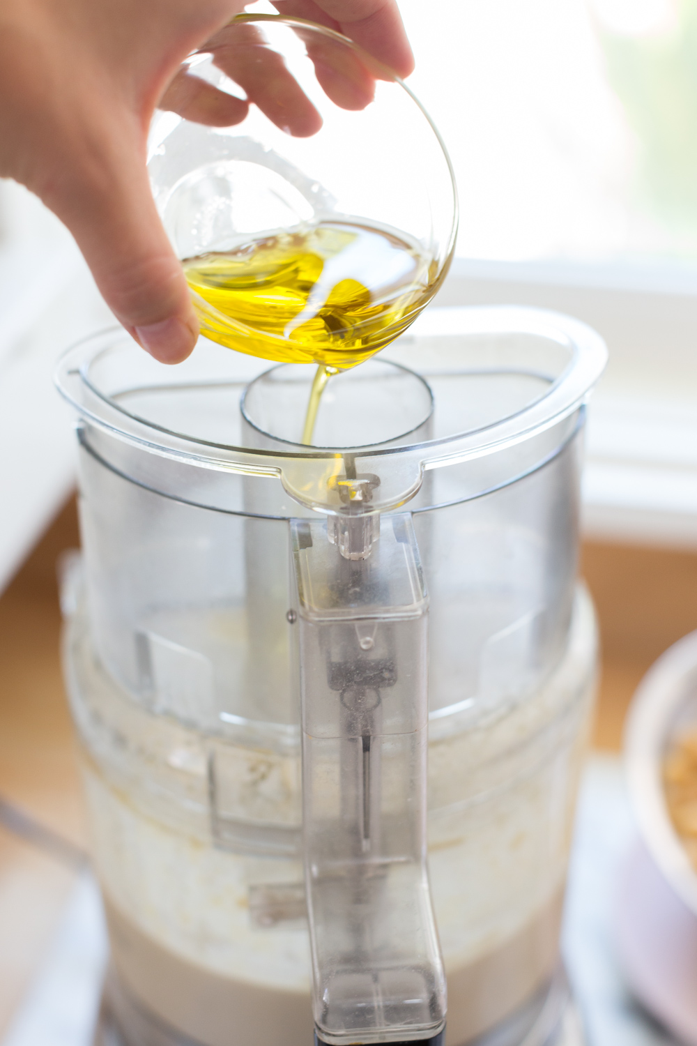 Creamy Dreamy Hummus add olive oil.