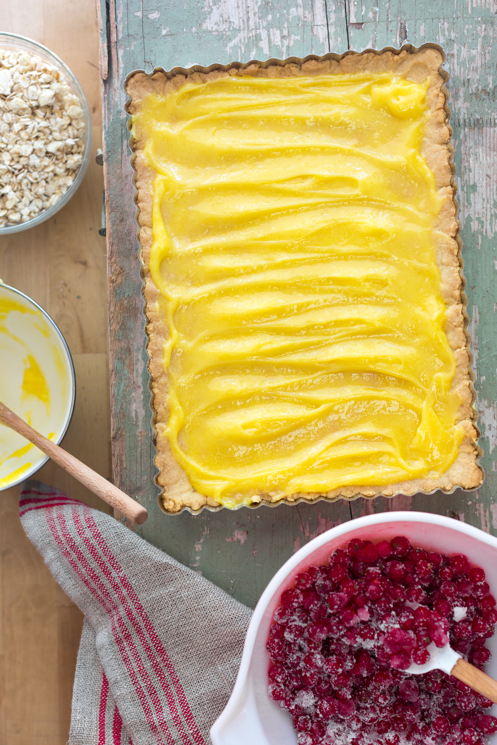 Red Currant Lemon Crumble Bars tart filled with lemon curd.