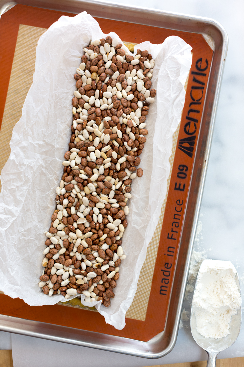 Ricotta & Amarena Cherry Tart with Pistachio Crust - blind bake