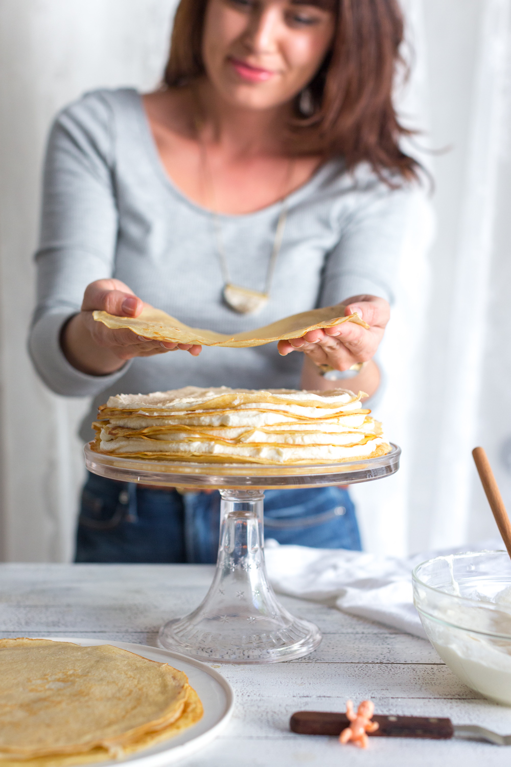 Crepe King Cake adding crepe layers