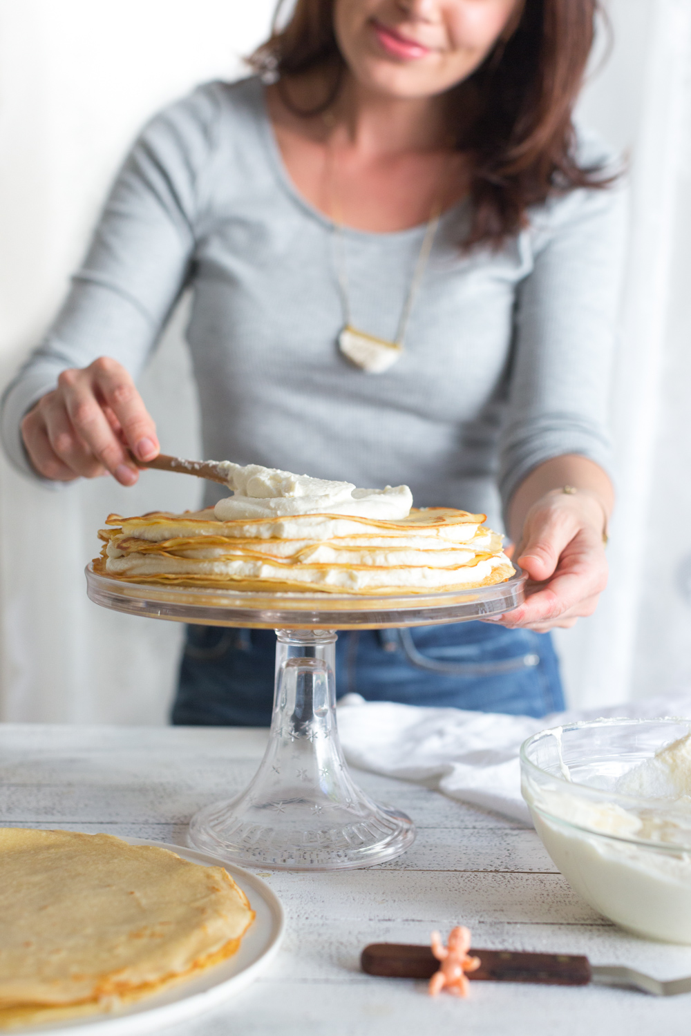 Crepe King Cake adding whipped mascarpone