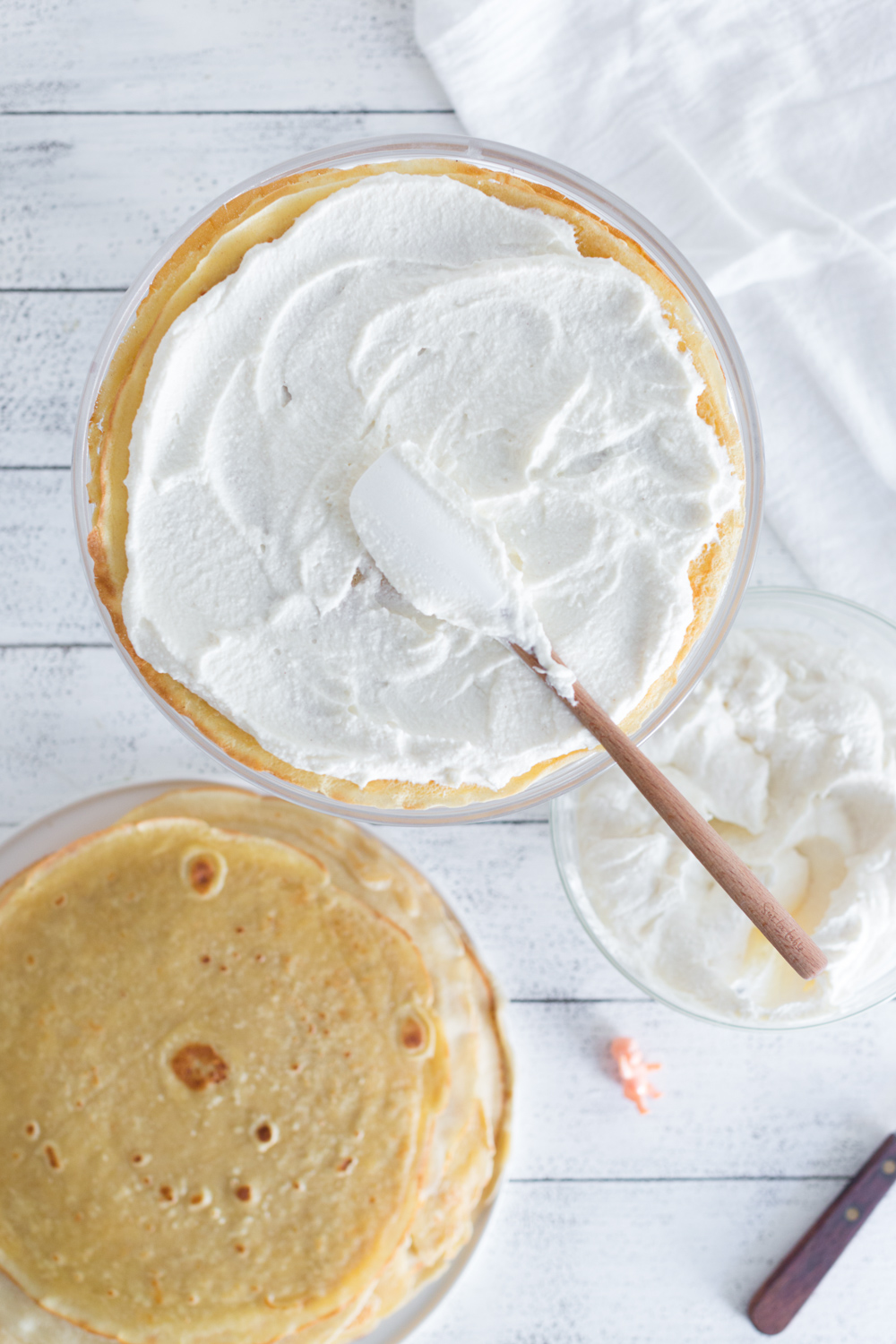 Crepe King Cake adding whipped mascarpone