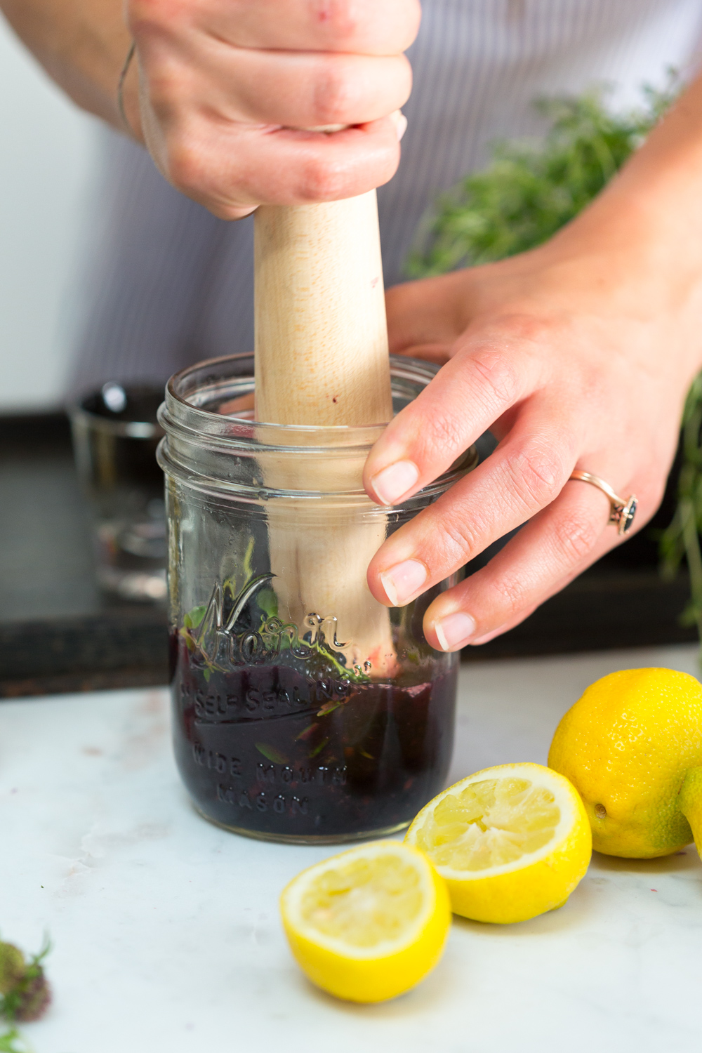 Blackberry Gin Smash - smashing berries