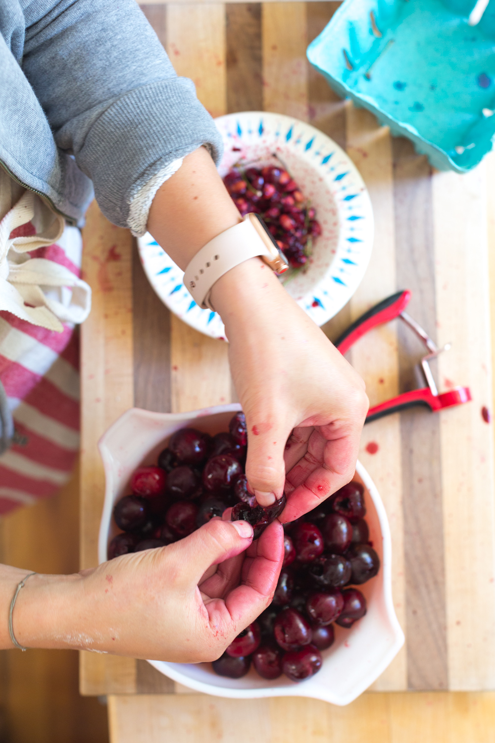 Pitting & splitting cherries for Cherry Almond Galettes