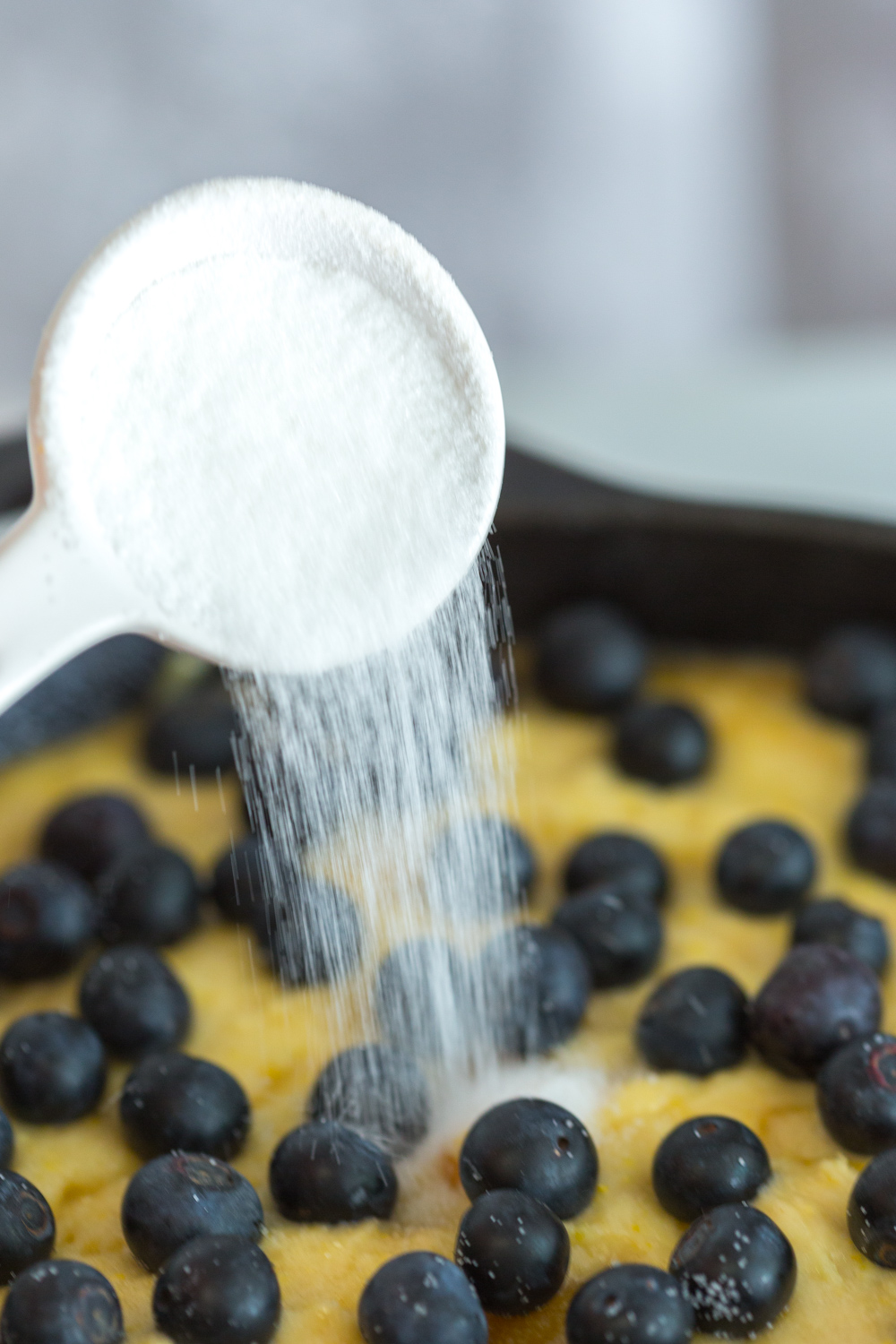 Sugar sprinkle on Blueberry Peach Cornmeal Skillet Cake