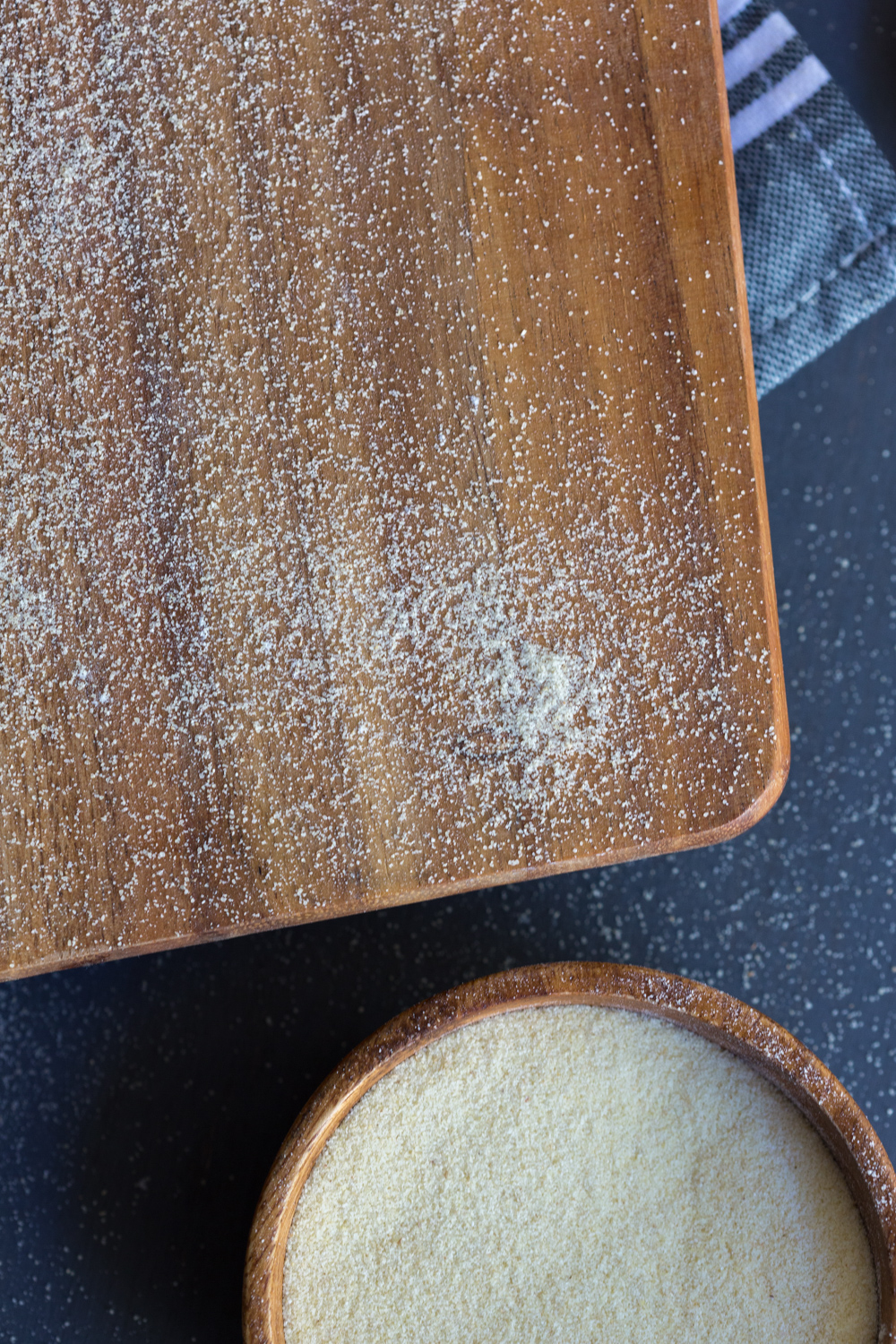 Pizza Peel with Semolina Flour for Tomato Confit Burrata and Arugula Pizza