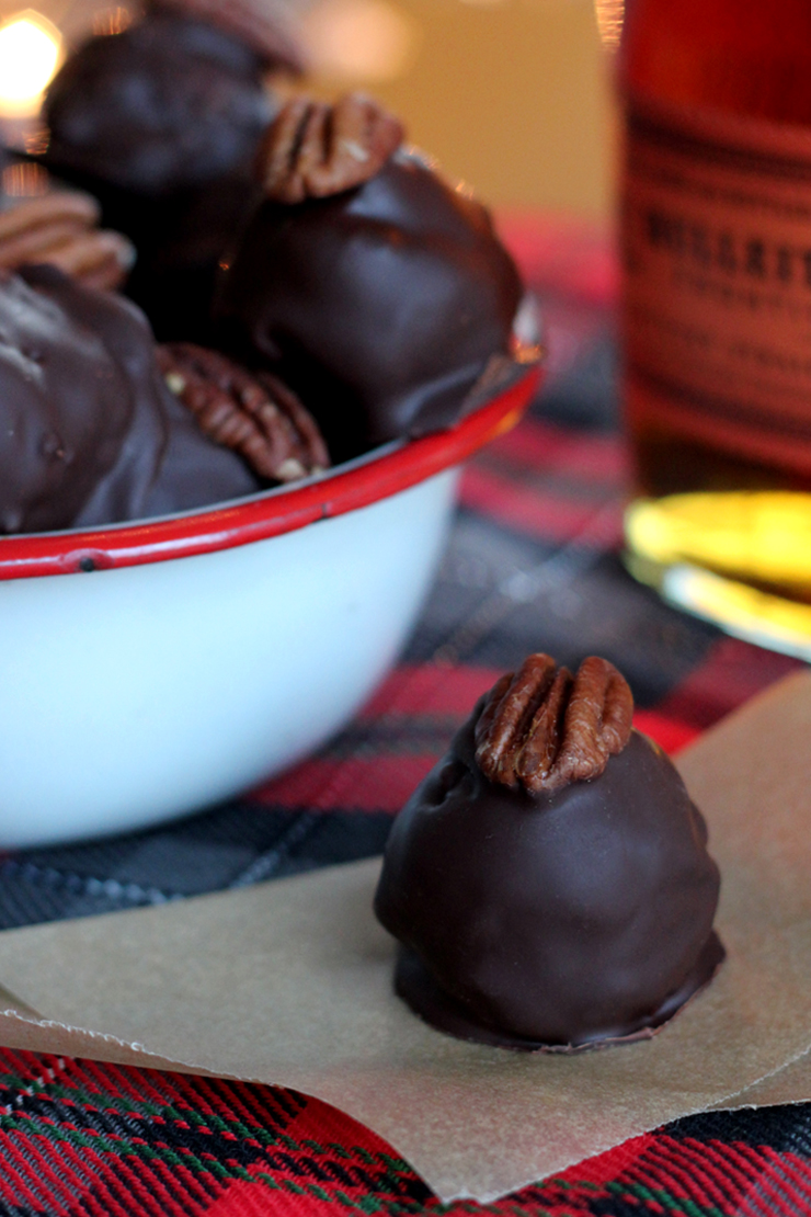 Classic Pecan Bourbon Balls get a spicy holiday kick of cinnamon, nutmeg and cloves.