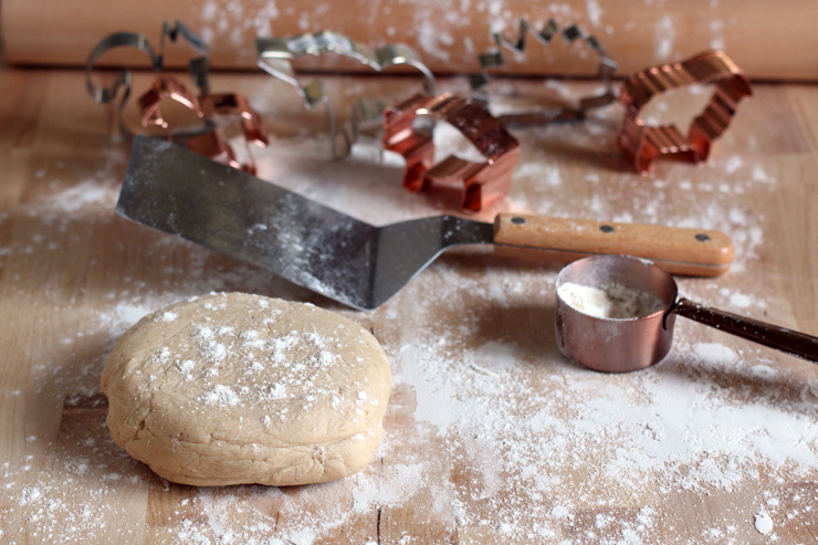 Animal Cookie Dough smashed into a disk and ready to roll out