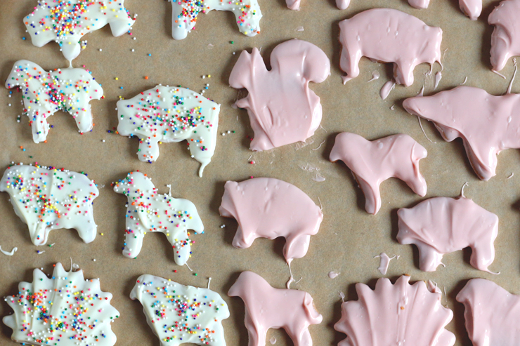 white and pink animal cookies, some with rainbow sprinkles
