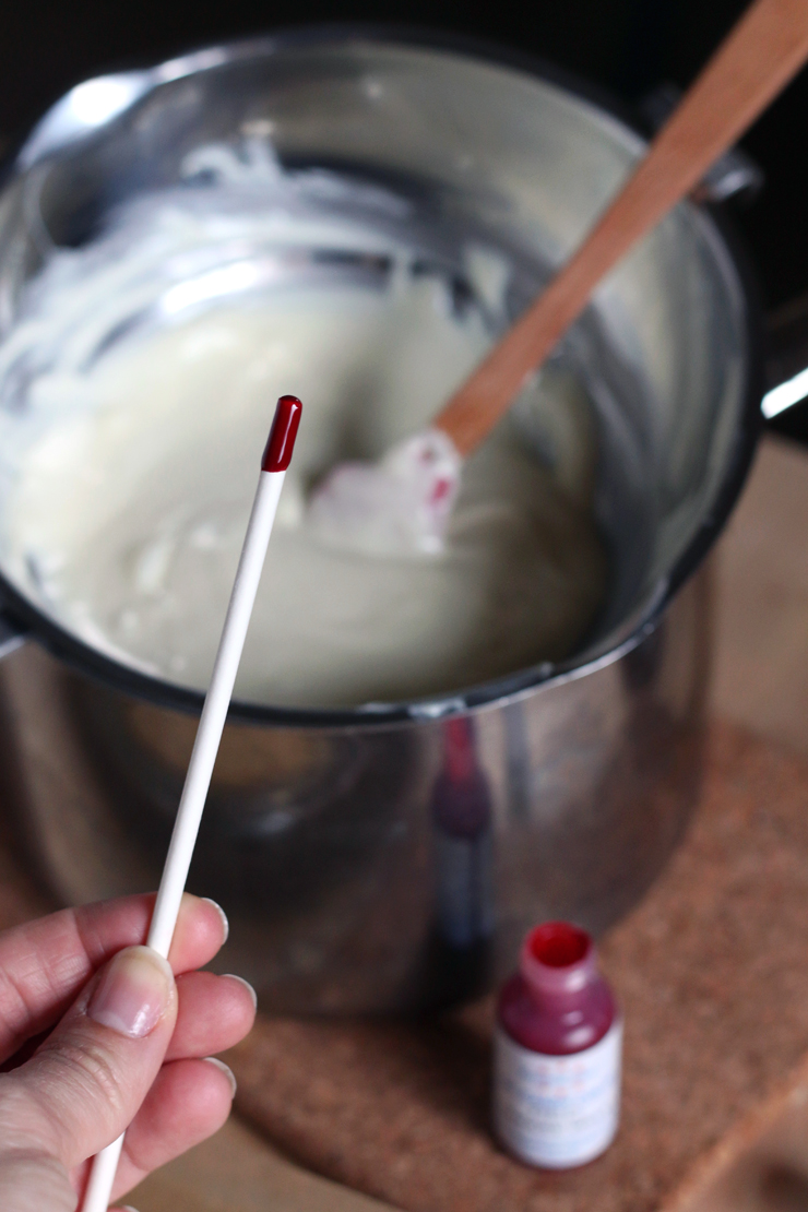 adding just a little food coloring to the frosting with a stick