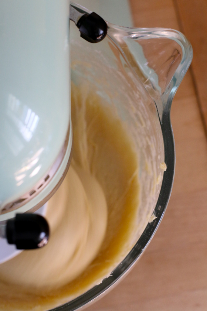 mixing dinner roll dough with dough hook