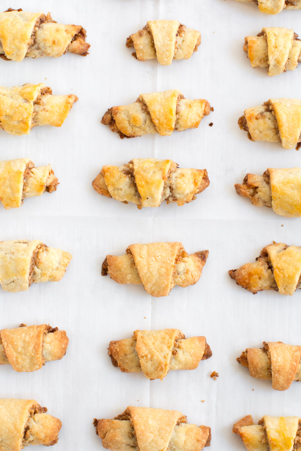 Maple Walnut Rugelach baked - overhead on parchment paper
