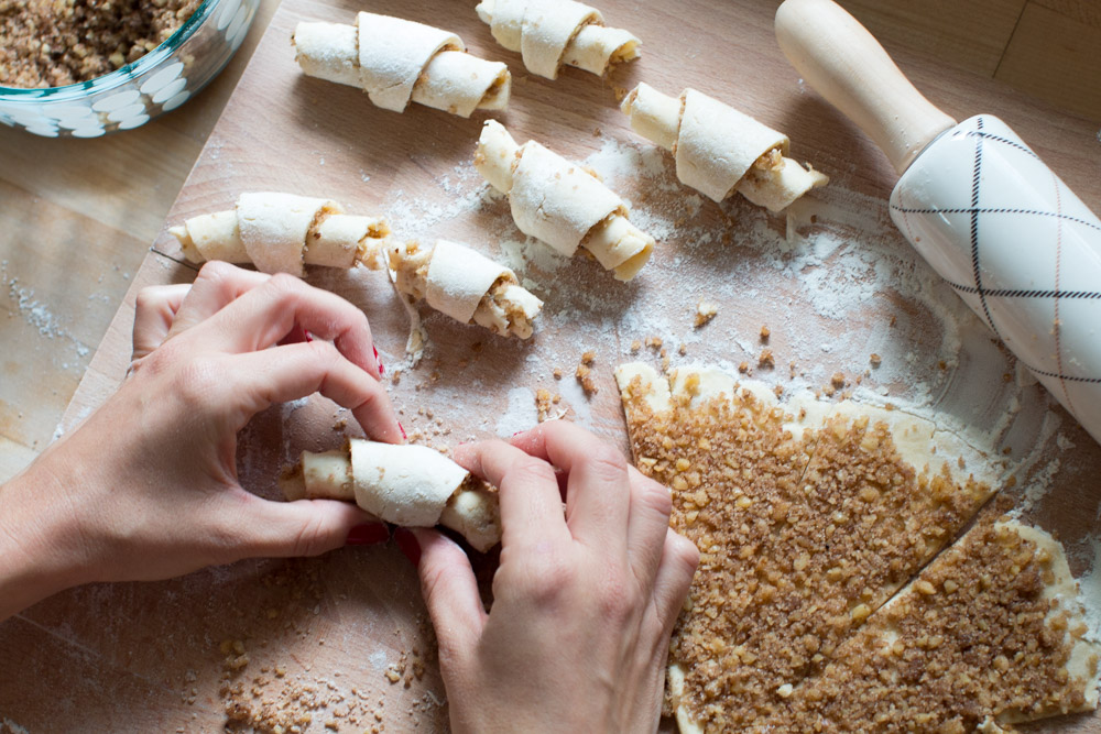 rolling filled Rugelach dough into shape