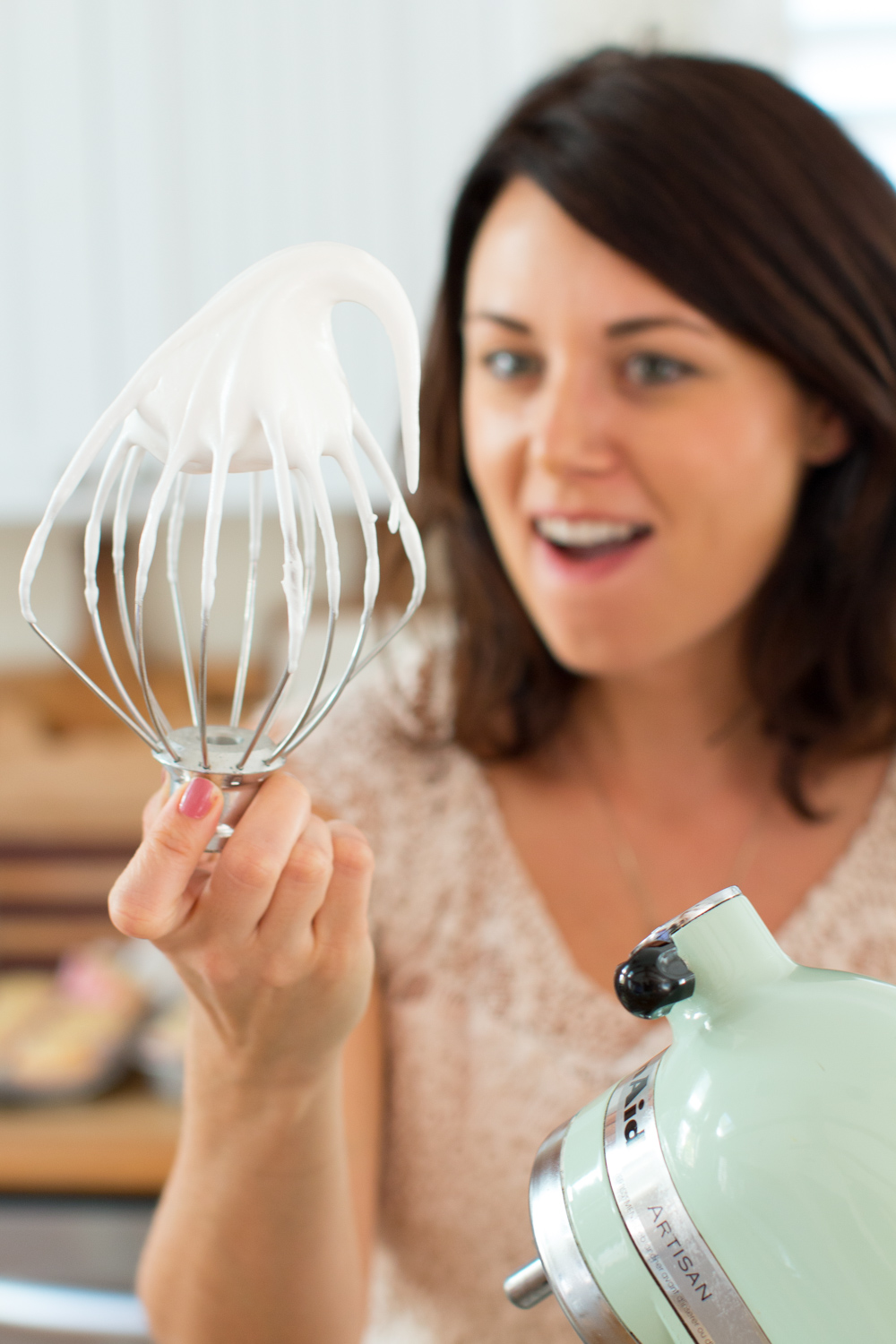 Becky Sue marvels at the meringue on the whisk