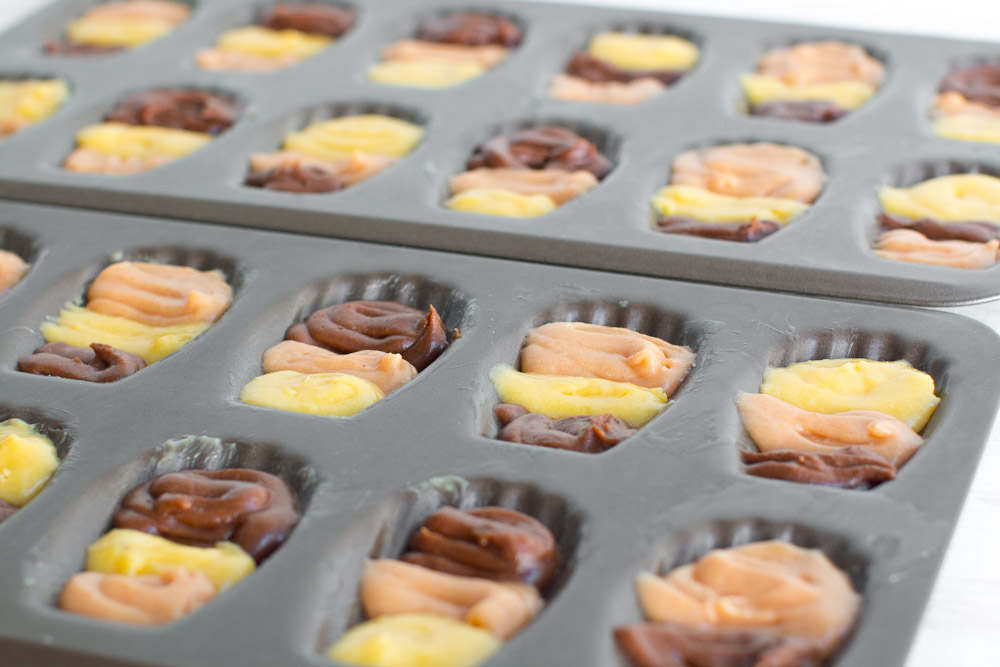 filling Madeleine molds with batter