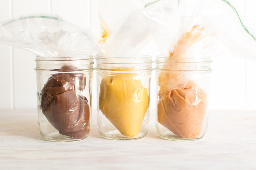 filling baggies with Madeleine batter in baggies