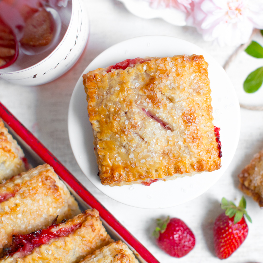 Strawberry Rhubarb Hand Pies with Pink Peppercorn Crust