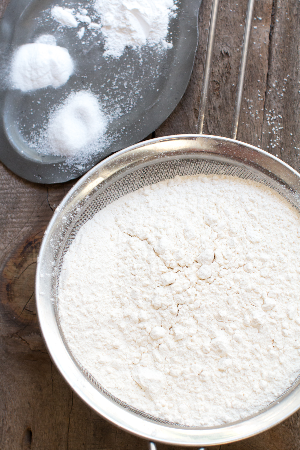 sifting dry cake ingredients